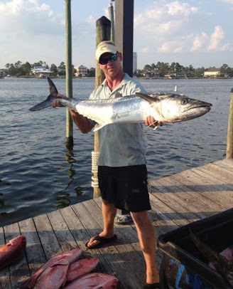 Fishing Guide Captain Rex Williams Offshore Fishing a King Mackerel